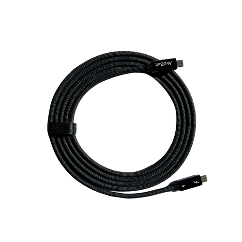 Black USB cable coiled on a white background