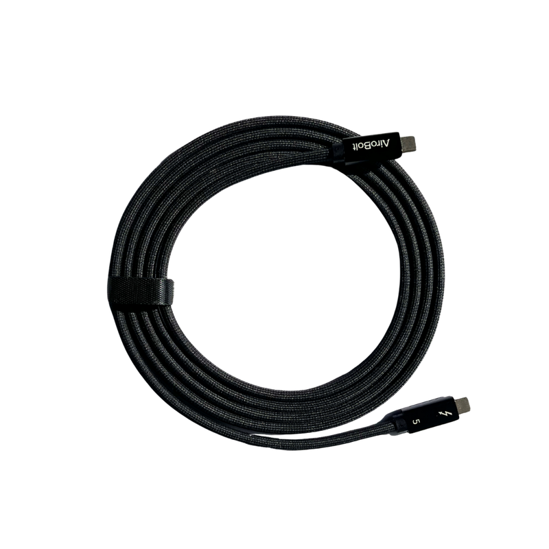 Black USB cable coiled on a white background